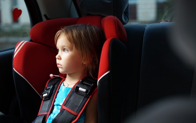 bigstock-Child-in-auto-baby-seat-in-car-12137609