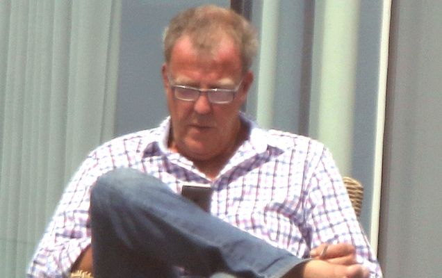 22.AUG.2015 - LONDON - UK *** STRICTLY NOT AVAILABLE FOR MAIL ONLINE AND ANY ONLINE SUBSCRIPTION DEALS UNLESS FEE AGREED PRIOR TO USAGE*** ** EXCLUSIVE PICTURES ** * STRICTLY NOT AVAILABLE FOR AUSTRALIA ** FORMER TOP GEAR PRESENTER JEREMY CLARKSON SPOTTED WITH A CIGARETTE AND A GLASS OF WINE CHILLING ON HIS BALCONY IN WEST LONDON.  HIS GIRLFRIEND RETURNS HOME WITH ZERO FAT 65P COKE AND TAKES DELIVERY OF AN ORANGE £259,000 2016 MCLAREN 750 LONGTAIL.  JEREMY WASN'T PRESENT FOR THE DELIVERY BYLINE MUST READ : XPOSUREPHOTOS.COM ***UK CLIENTS - PICTURES CONTAINING CHILDREN PLEASE PIXELATE FACE PRIOR TO PUBLICATION *** UK CLIENTS MUST CALL PRIOR TO TV OR ONLINE USAGE PLEASE TELEPHONE 0208 344 2007**  August 24, 2015  *** Local Caption ***